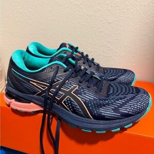 ASICS Navy Running Shoes with Teal and Coral Accents. GT- 2000